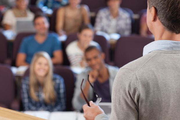 Presenter speaking to a group of students